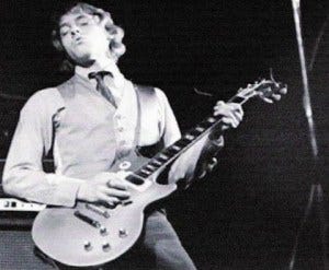 Bruce Allen performing live with the Tsetse Flies era lineup.